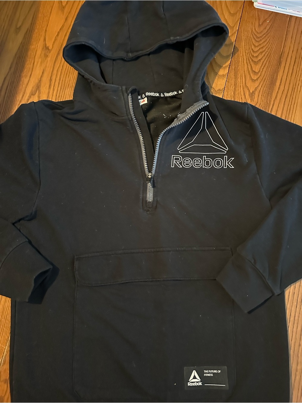 Black Reebok half‑zip hoodie i